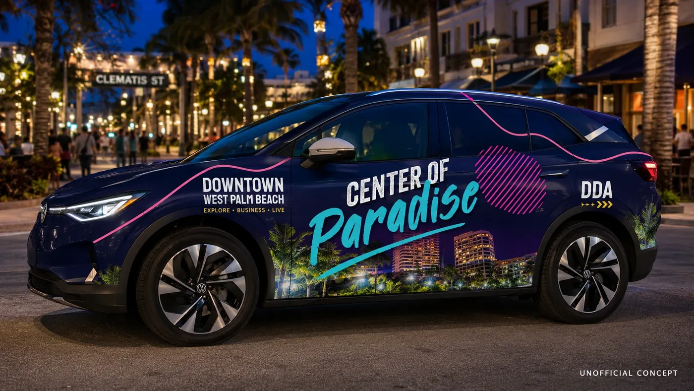 Electric SUV wrapped for the Downtown West Palm Beach Development Authority on Clematis Street at night